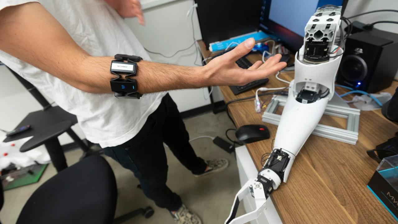 Peyton Young demonstrates electromyography using robotic arm