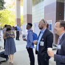 Dr. Leigh Hochberg (right) and Dr. David Brandman (second from right) during the poster competition